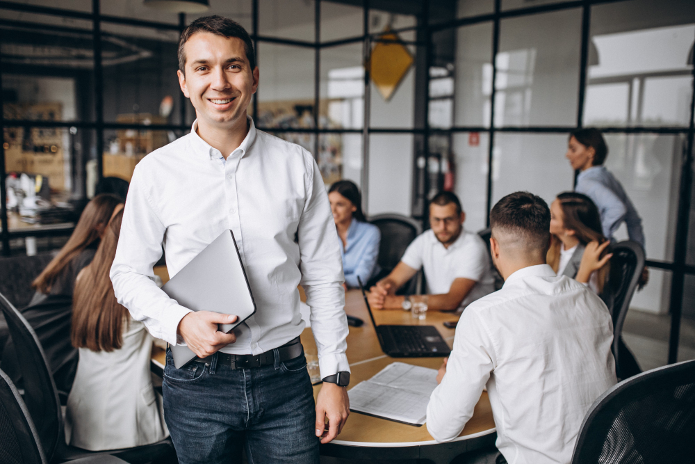 Specialist recruiter with their team in a modern office